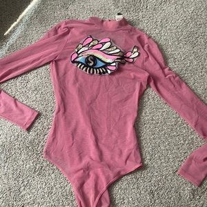 Mesh bodysuit with unique patch